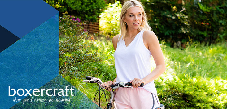 Merch Outfitters - Example Image of Branded Corporate Goods & Branding Items - Boxercraft logo and woman on bike wearing tank top and shorts