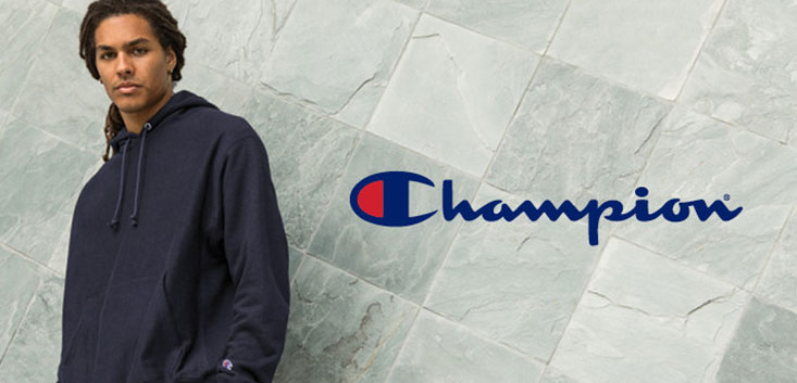 Merch Outfitters - Example Image of Branded Corporate Goods & Branding Items - Champion logo and male model wearing sweatshirt