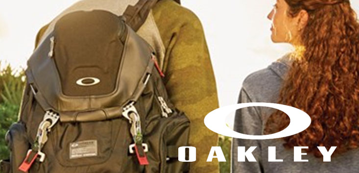 Merch Outfitters - Example Image of Branded Corporate Goods & Branding Items - Oakley logo and man wearing Oakley backpack