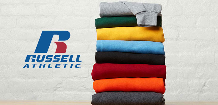 Merch Outfitters - Example Image of Branded Corporate Goods & Branding Items - Russell Athletic logo and pile of colorful sweatshirts