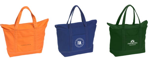 3 logo printed colored tote bags in a row