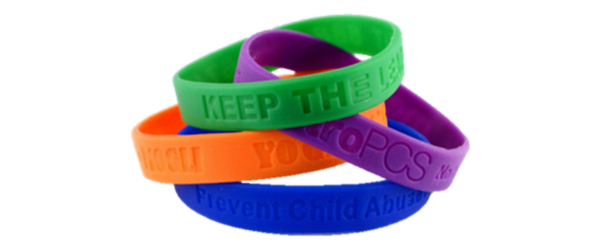 Pile of 4 debossed silicone wristbands in different colors